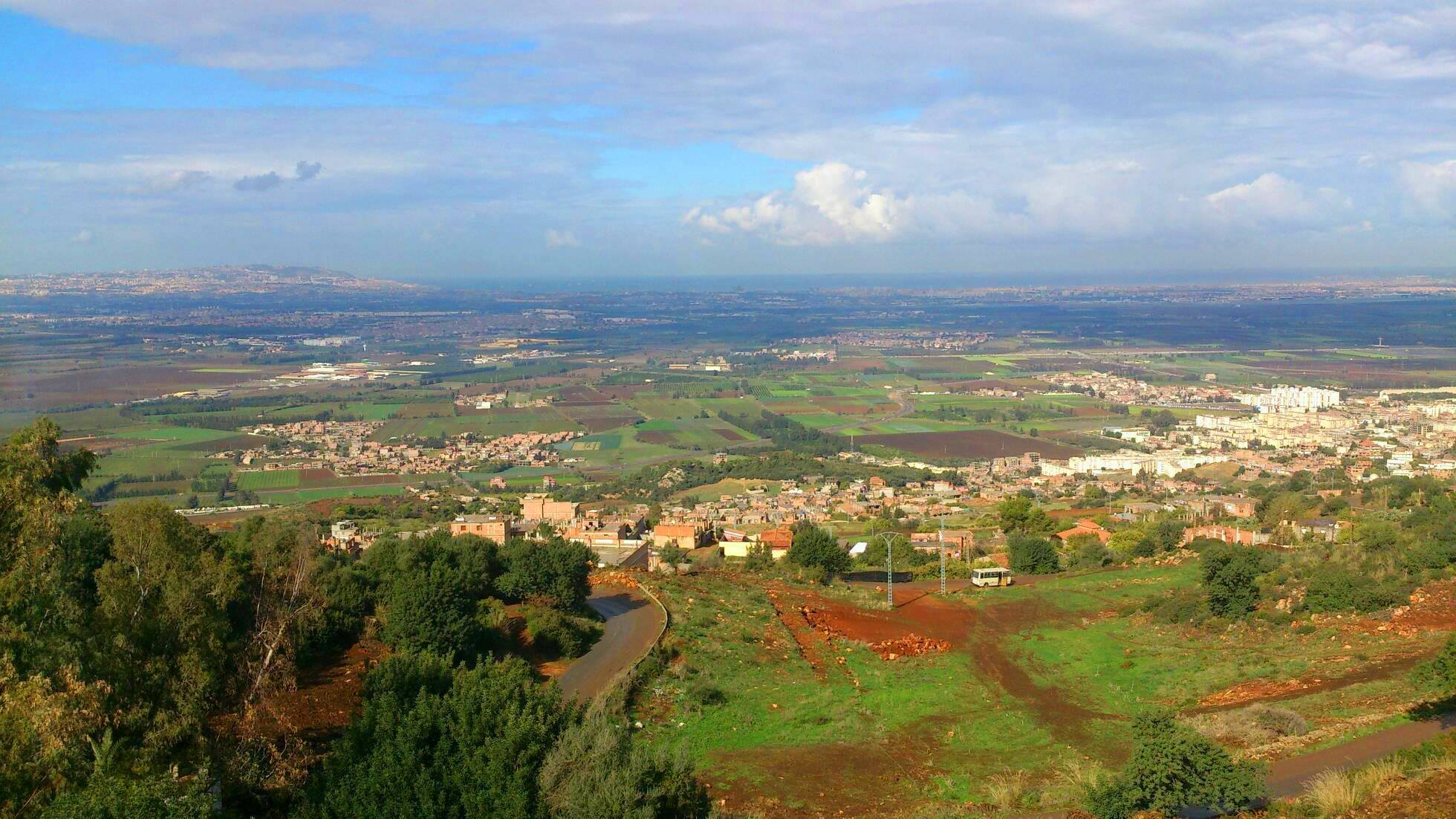 Meftah city in Blida, surrounded by green fields and located in the Mitidja plain.